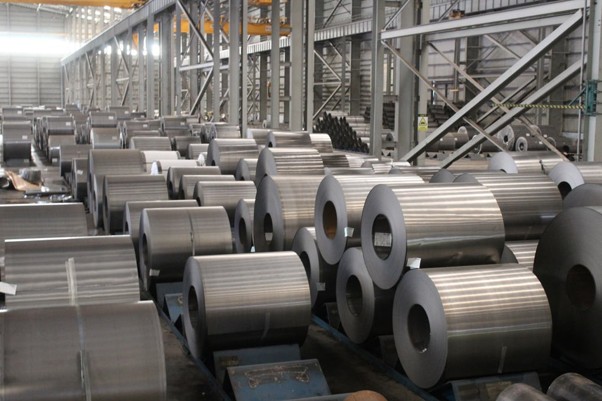 Rows of metal coils in warehouse