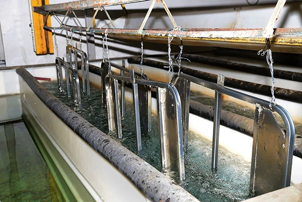 metal surface cleaning by chemical immersion process.jpg